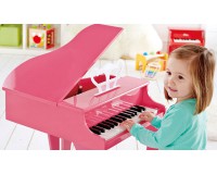 Рожеве фортепіано зі стільчиком